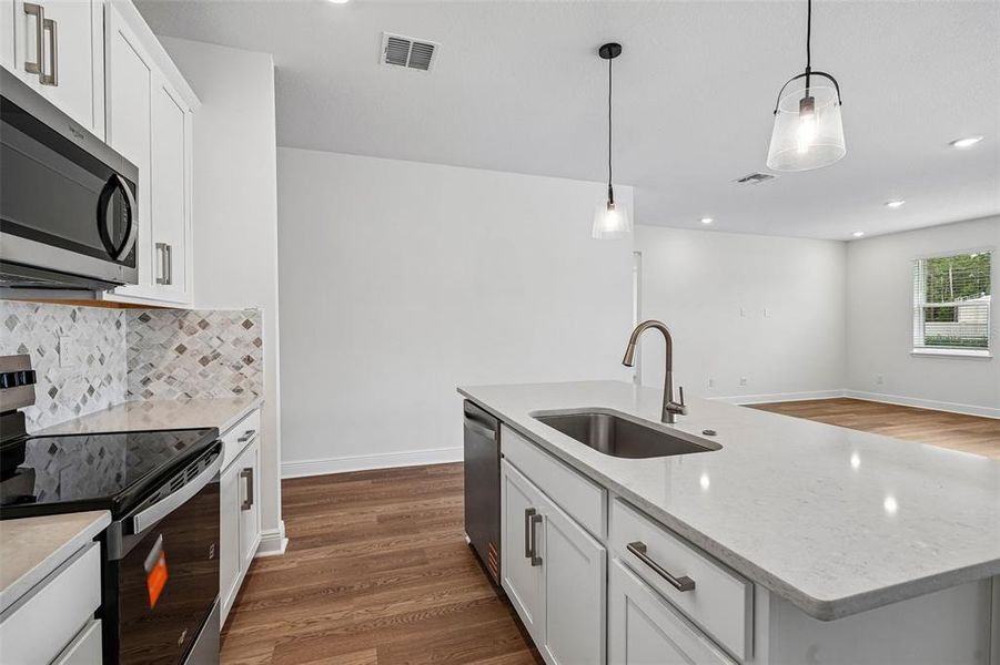 Furnished interior view inside a new home in Legends Preserve - Signature Series, Daytona Beach (Image 12).