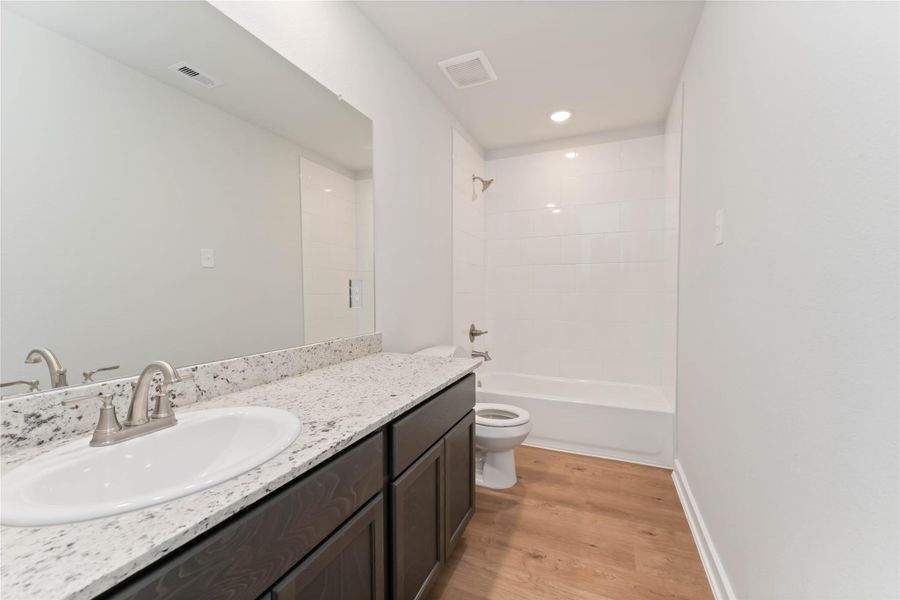 Furnished interior view inside a new home in The Landing, New Caney (Image 6). Furnished interior view inside a new home in The Landing, New Caney (Image 6).
