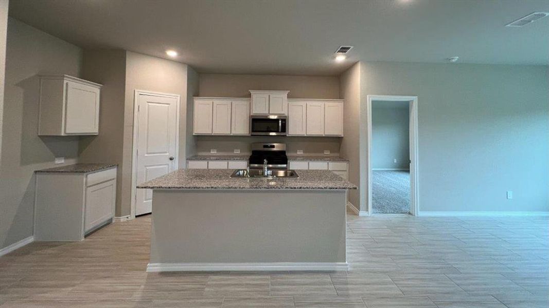 Furnished interior view inside a new home in Rosewood at Beltmill, Fort Worth (Image 8). Furnished interior view inside a new home in Rosewood at Beltmill, Fort Worth (Image 8).