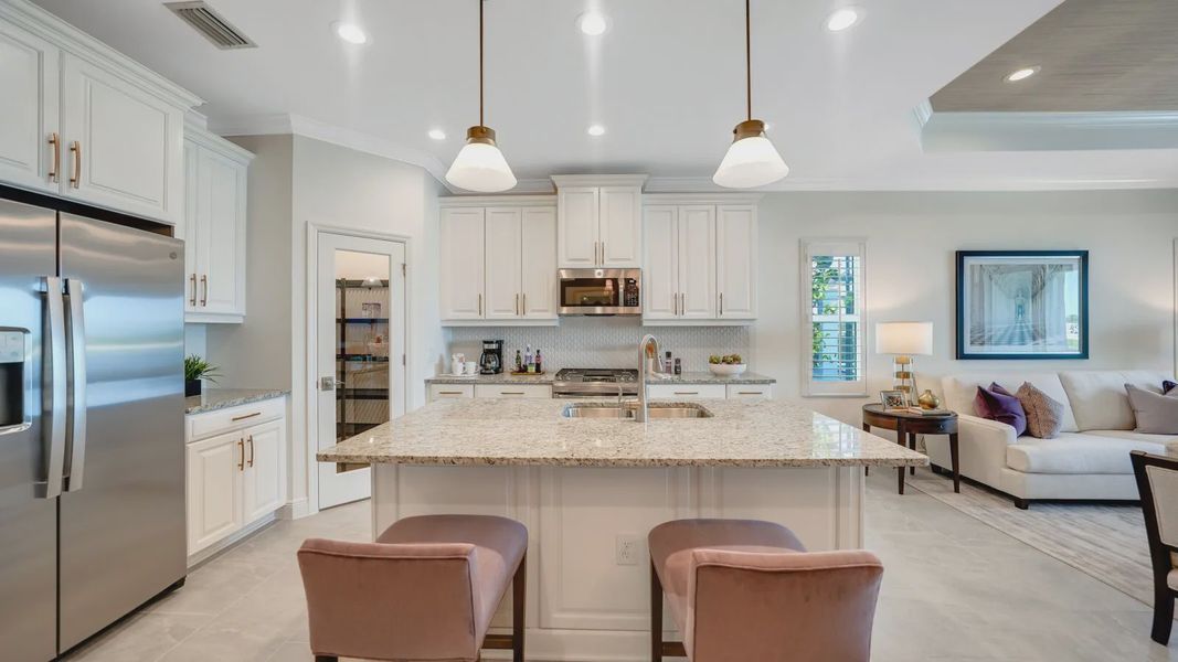 Representative furnished interior of a home built from the Dream 2 by Neal Communities in SkySail, Naples (Image 15).