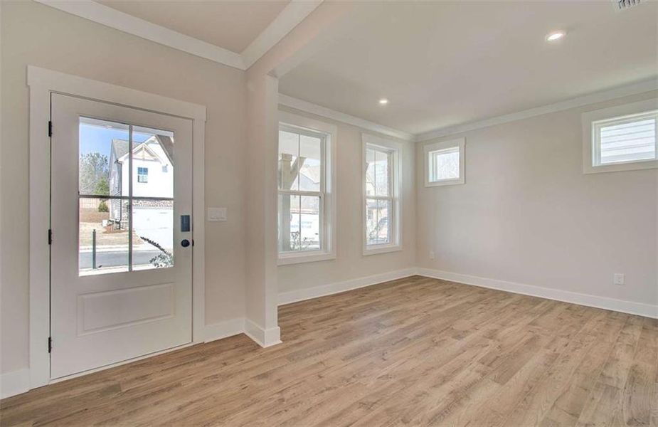 Spacious, unfurnished interior of a new home in The Paddocks at Doc Hughes, Buford (Image 22).