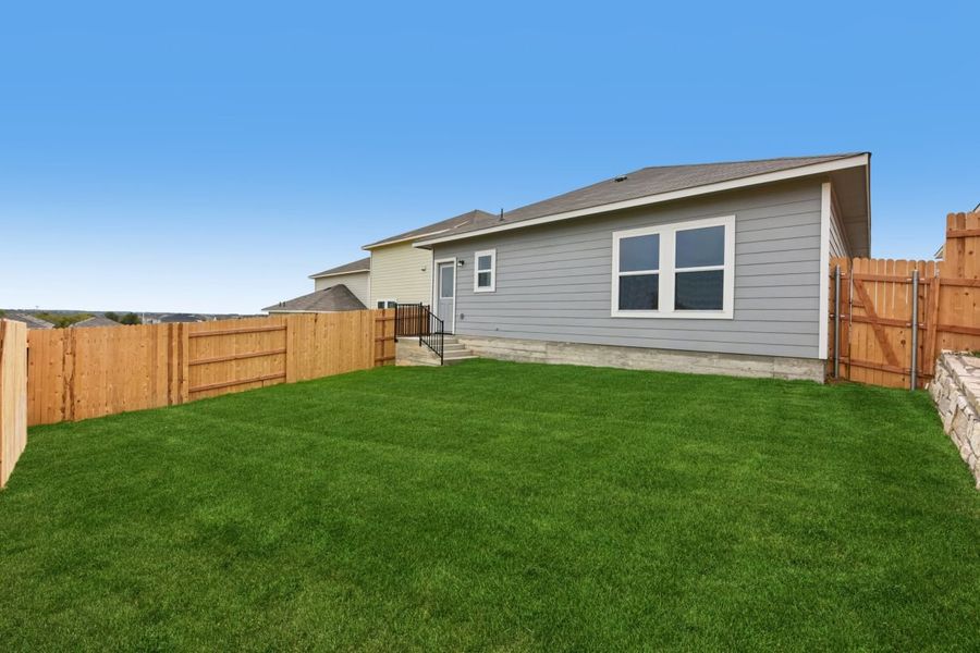 Exterior details and patio area of a home in Edgebrooke, Pflugerville (Image 3).