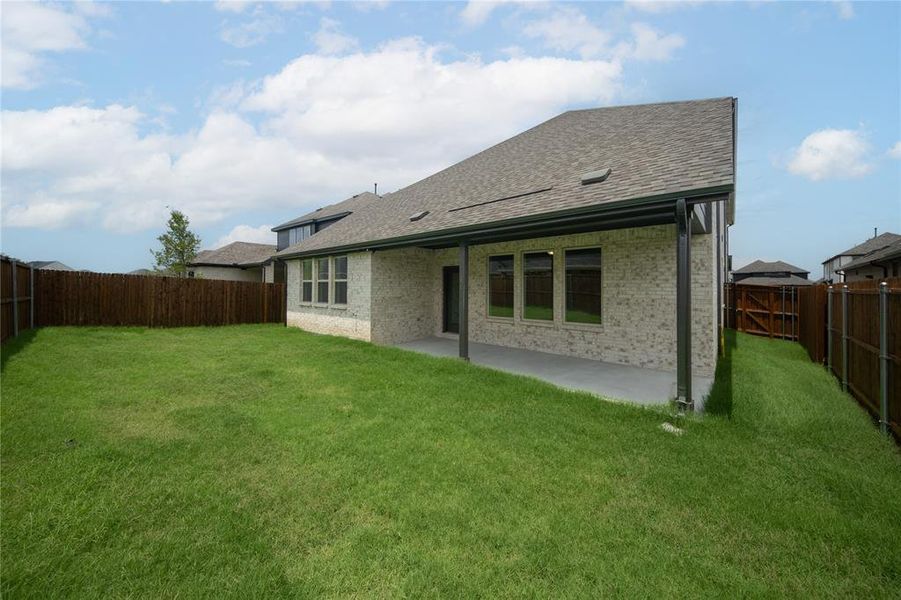 Front exterior of a new home in Valencia on the Lake: Valencia 50s, Little Elm, TX, highlighting curb appeal (Image 2). Front exterior of a new home in Valencia on the Lake: Valencia 50s, Little Elm, TX, highlighting curb appeal (Image 2).