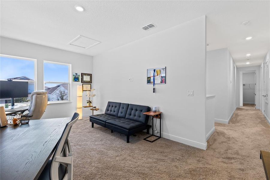 Furnished interior view inside a new home in Laureate Park, Orlando (Image 20).