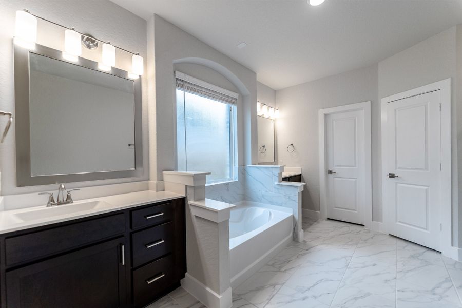 Furnished interior view inside a new home in The Woodlands at Medina Hills, Mico (Image 7).