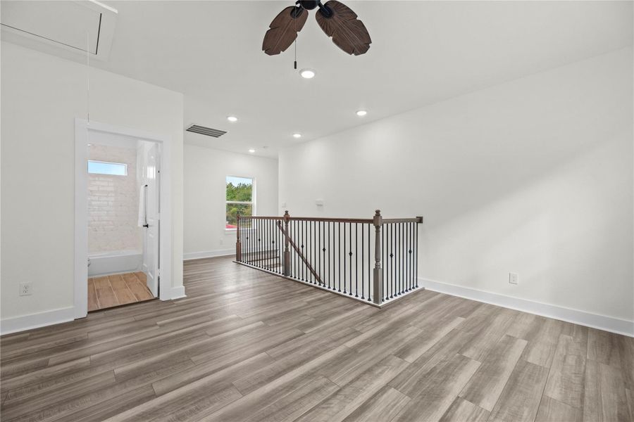 This upstairs flex space provides endless possibilities — transform it into a dedicated home office, workout room, or creative studio. Its modern finishes and clean lines make it both functional and stylish. This upstairs flex space provides endless possibilities — transform it into a dedicated home office, workout room, or creative studio. Its modern finishes and clean lines make it both functional and stylish.