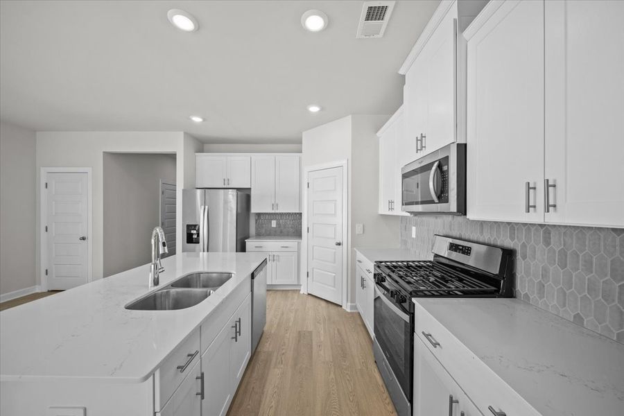 Furnished interior view inside a new home in Brayfield Manor - Heritage Collection, Wellford (Image 5).