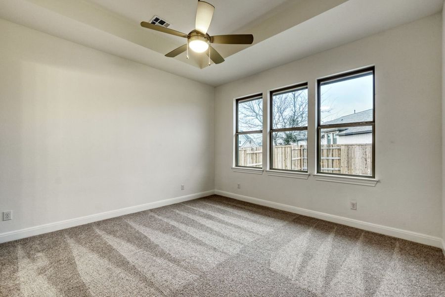 Spacious, unfurnished interior of a new home in 6 Creeks, Kyle (Image 10).