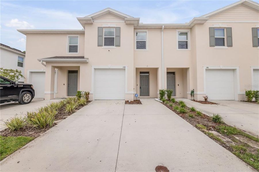 Front exterior of a new home in , Daytona Beach, FL, highlighting curb appeal (Image 21). Front exterior of a new home in , Daytona Beach, FL, highlighting curb appeal (Image 21).