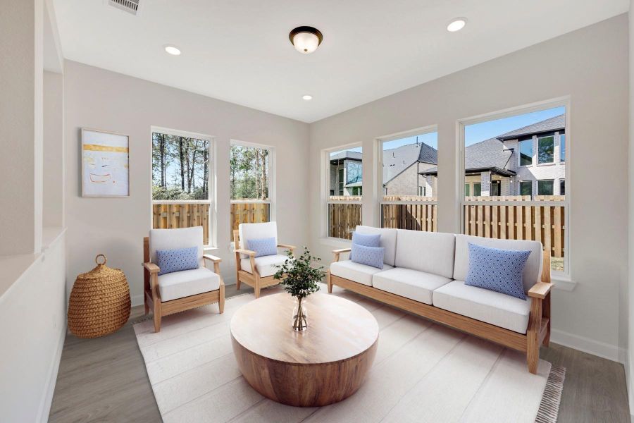 EXAMPLE PHOTO: Imagine hanging out with friends and family in this beautiful sunroom that is bathed in sunlight!