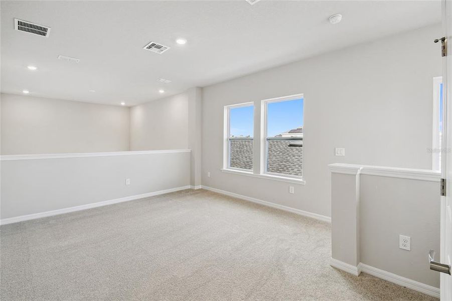 Spacious, unfurnished interior of a new home in Weslyn Park in Sunbridge 34', St. Cloud (Image 34).