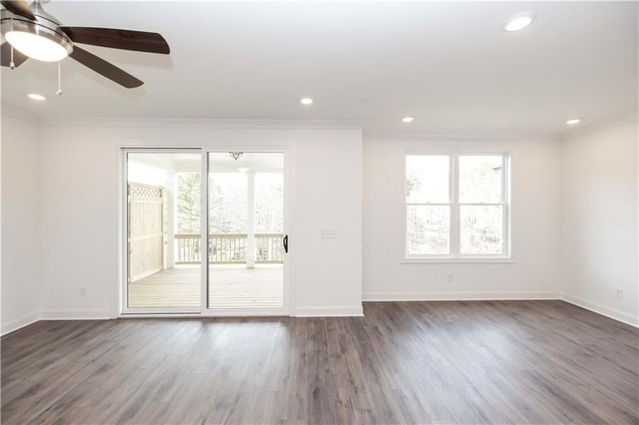 Covered patio - fenced in backyard - Pictures represent a previously built home, not the actual home.