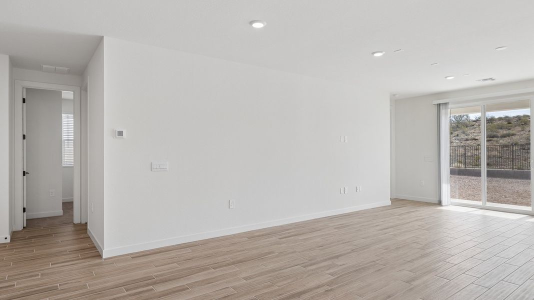 Spacious, unfurnished interior of a new home in The Ridge at Stone Butte, Phoenix (Image 21).