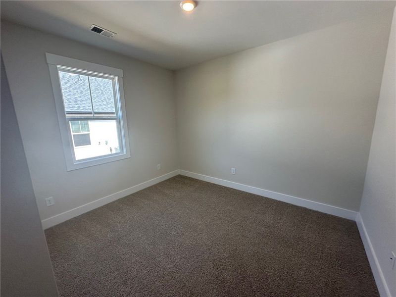This versatile room offers a comfortable and priva