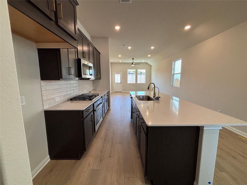 Furnished interior view inside a new home in Cannon Ranch 40s, Dripping Springs (Image 7).