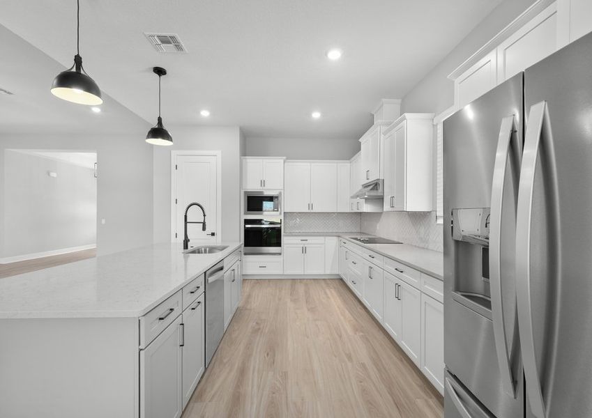 Stainless steel appliances are included.