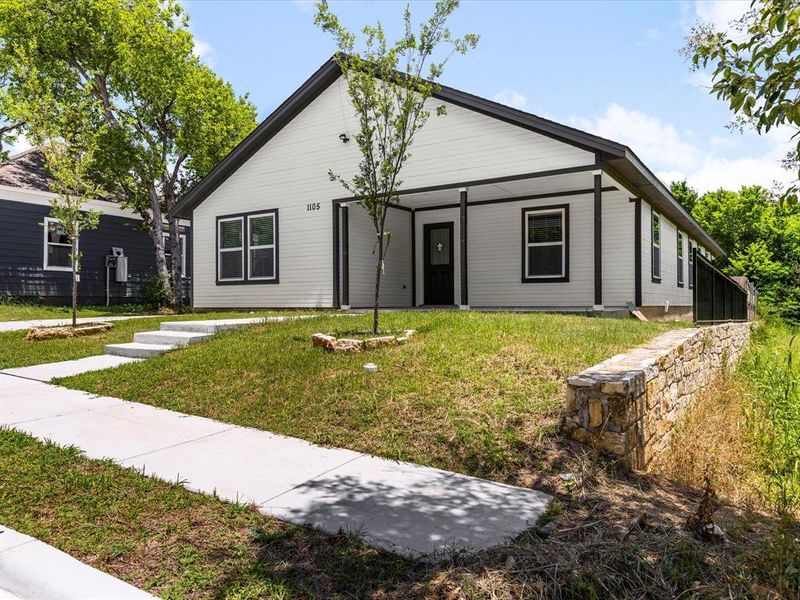 Front exterior of a new home in , Fort Worth, TX, highlighting curb appeal (Image 25). Front exterior of a new home in , Fort Worth, TX, highlighting curb appeal (Image 25).