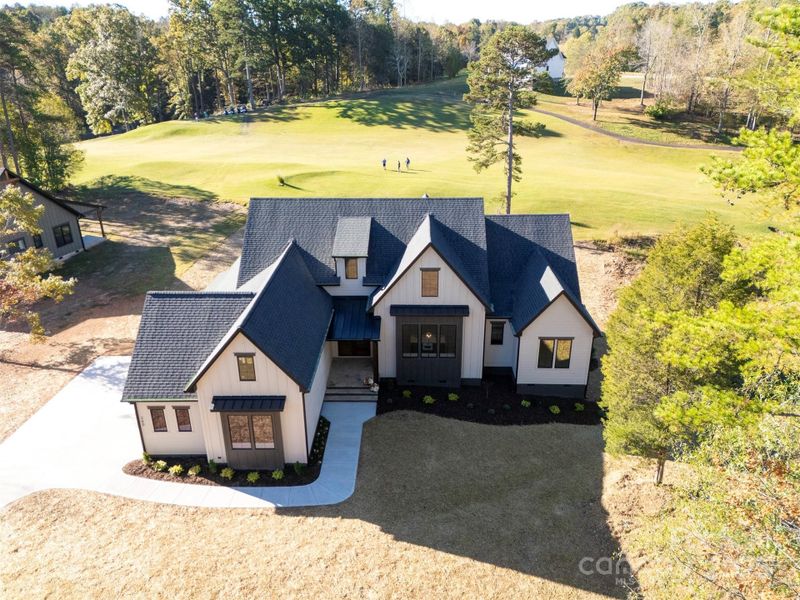 Aerial of home and course Aerial of home and course