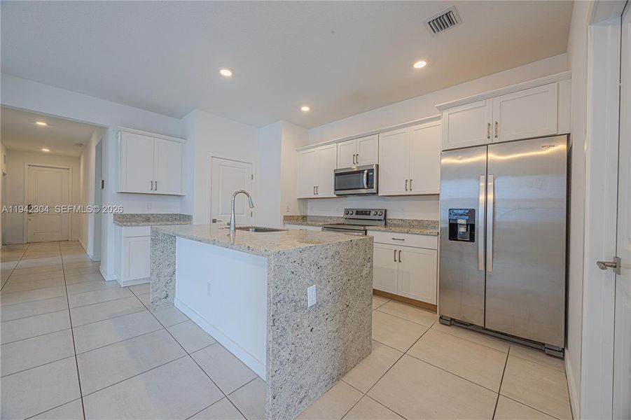 Furnished interior view inside a new home in , Jupiter (Image 8). Furnished interior view inside a new home in , Jupiter (Image 8).