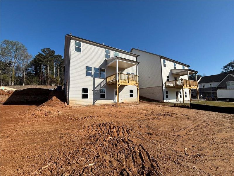 Exterior details and patio area of a home in Arbors at Richland Creek, Buford (Image 7).