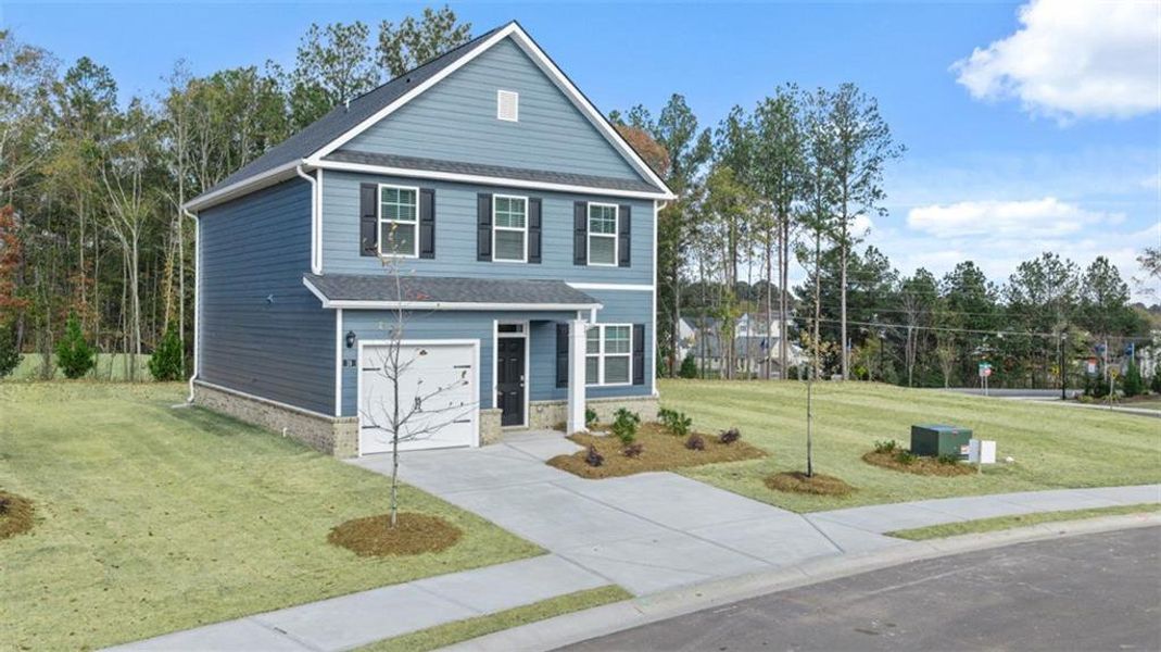 Front exterior of a new home in Willowbrook, Winder, GA, highlighting curb appeal (Image 2).
