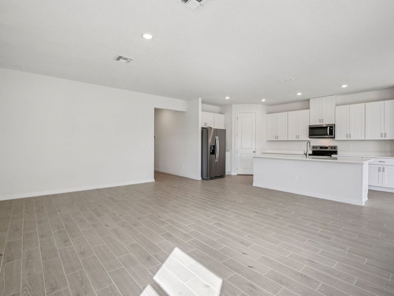 Spacious, unfurnished interior of a new home in Coasterra - Reserve Series, Palmetto (Image 8).