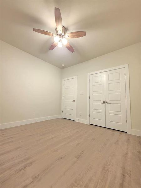 Picture of spare bedroom and closet which is seperate room from the opposite side from the master/ primary bedroom.