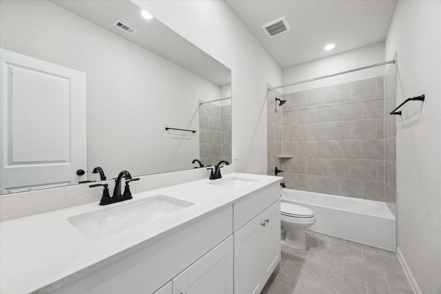 Furnished interior view inside a new home in Elyson, Katy (Image 13).