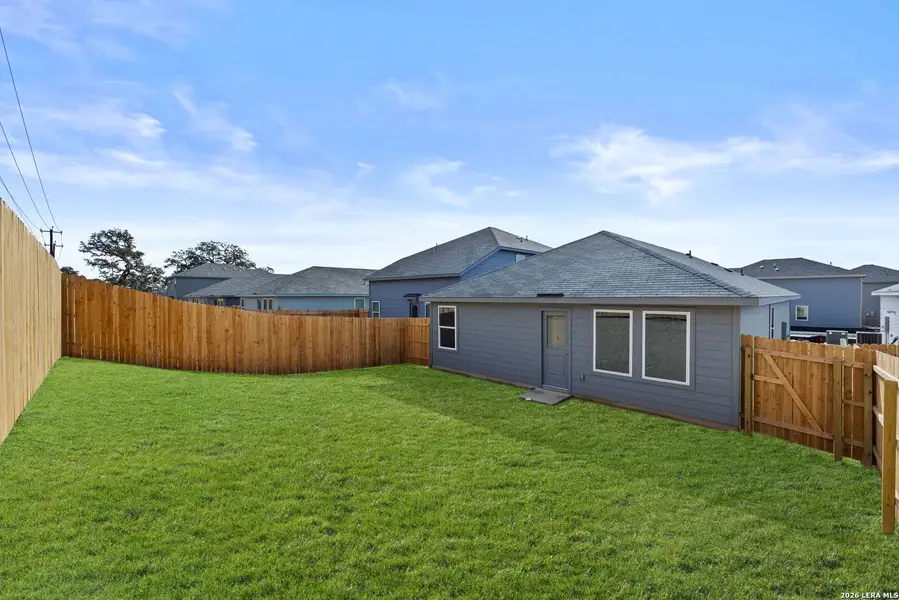 Exterior details and patio area of a home in Waterwheel, San Antonio (Image 2).