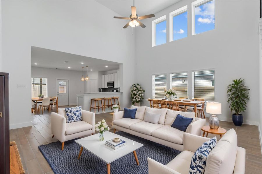 Virtually staged to help you envision your lifestyle! This spacious living area is perfect for relaxing or entertaining, with natural light pouring in through oversized windows. Virtually staged to help you envision your lifestyle! This spacious living area is perfect for relaxing or entertaining, with natural light pouring in through oversized windows.