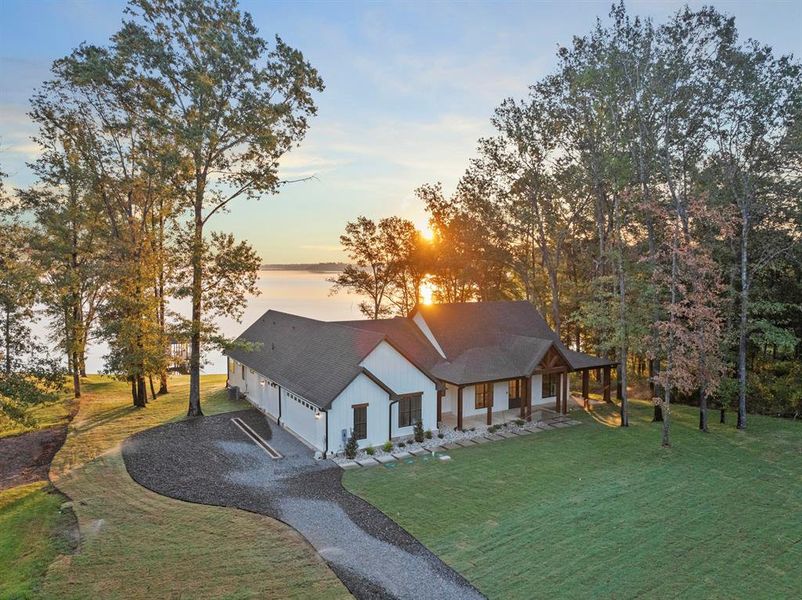 Front exterior of a new home in , Leesburg, TX, highlighting curb appeal (Image 1). Front exterior of a new home in , Leesburg, TX, highlighting curb appeal (Image 1).