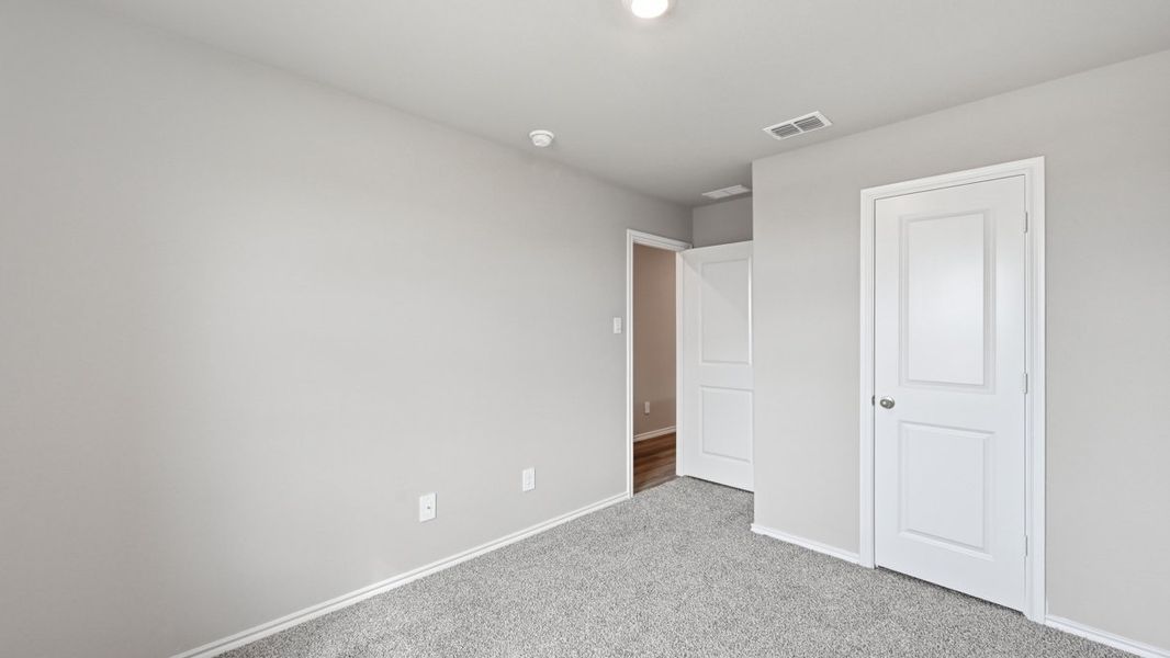 Representative unfurnished interior of a home built from the Dalton by D.R. Horton in Hickory Grove, Krum (Image 31).
