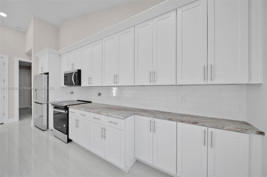 Spacious, unfurnished interior of a new home in , Cape Coral (Image 23). Spacious, unfurnished interior of a new home in , Cape Coral (Image 23).