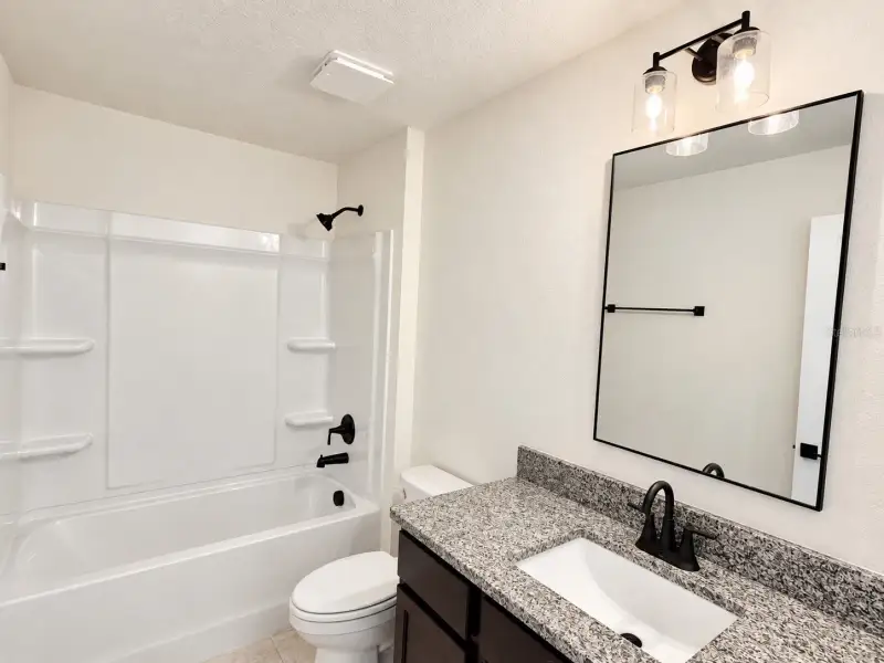 Furnished interior view inside a new home in Harmony Central, Harmony (Image 5).