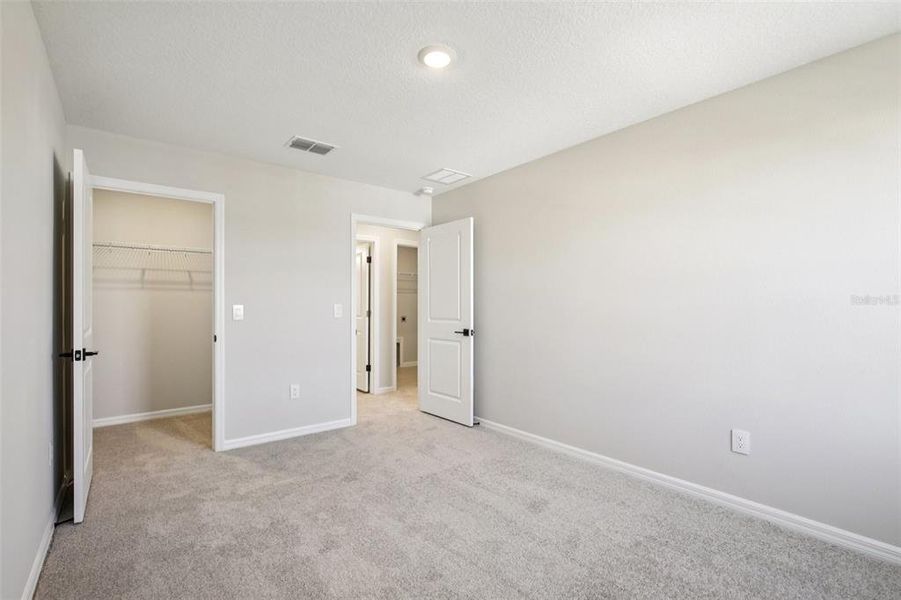 Spacious, unfurnished interior of a new home in Berry Bay, Wimauma (Image 30).