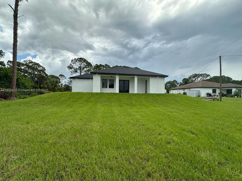 Exterior details and patio area of a home in , Lehigh Acres (Image 24).