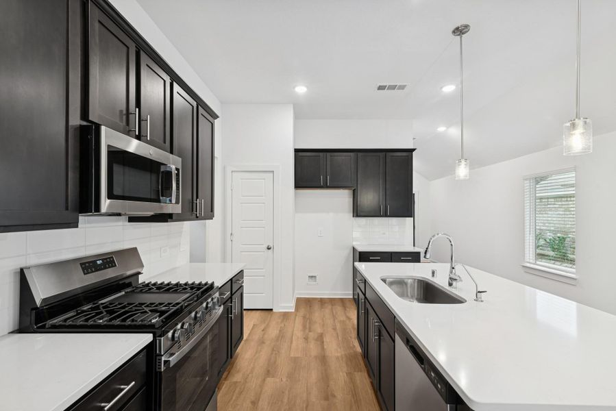 Furnished interior view inside a new home in Pinewood at Grand Texas, New Caney (Image 3).