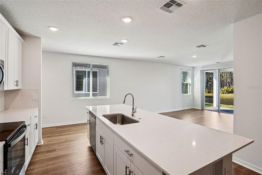 Furnished interior view inside a new home in Ridgehaven - Villas, Ormond Beach (Image 5).