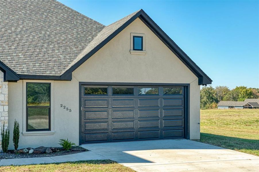 Front exterior of a new home in , Emory, TX, highlighting curb appeal (Image 16).
