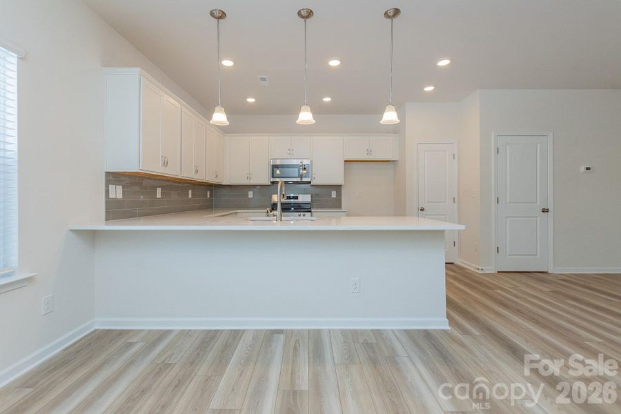 Furnished interior view inside a new home in Country Club Village, Salisbury (Image 7).