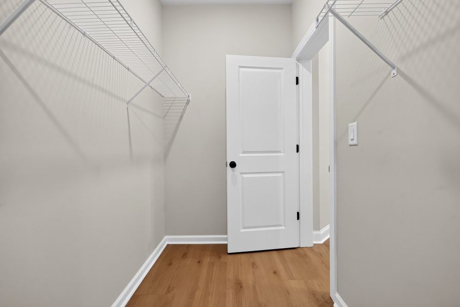 Representative unfurnished interior of a home built from the The Benton IV by The Providence Group in Ward's Crossing Townhomes, Johns Creek (Image 24).