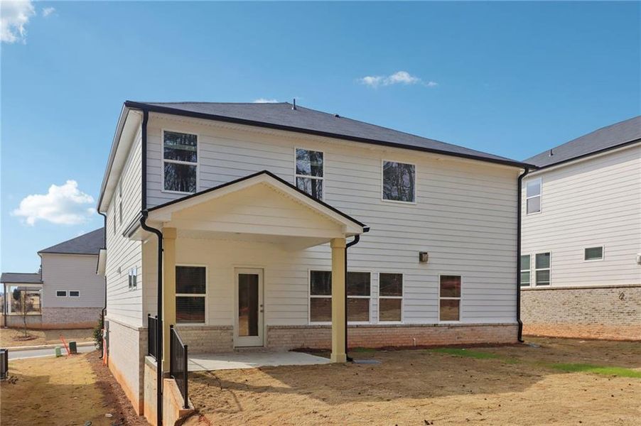 Exterior details and patio area of a home in Harmony Manor, Fairburn (Image 32).