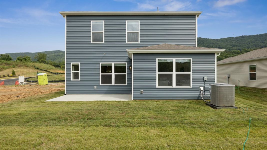 Front exterior of a new home in Emory Creek, Harriman, TN, highlighting curb appeal (Image 16). Front exterior of a new home in Emory Creek, Harriman, TN, highlighting curb appeal (Image 16).