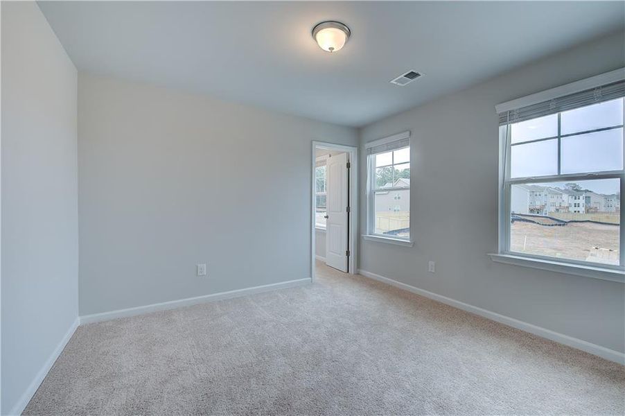 Spacious, unfurnished interior of a new home in Cooper Park, McDonough (Image 25).