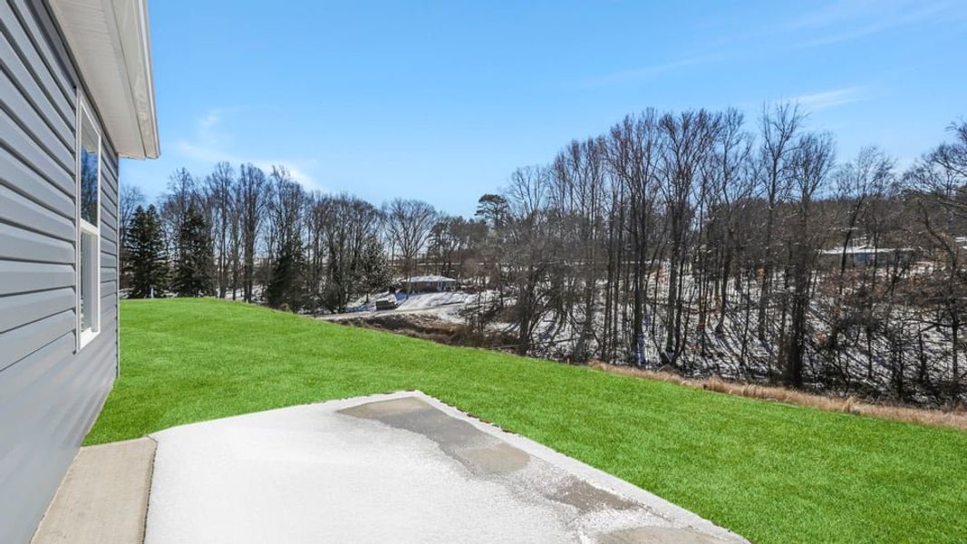 Exterior details and patio area of a home in Harper Ridge, Roebuck (Image 20).