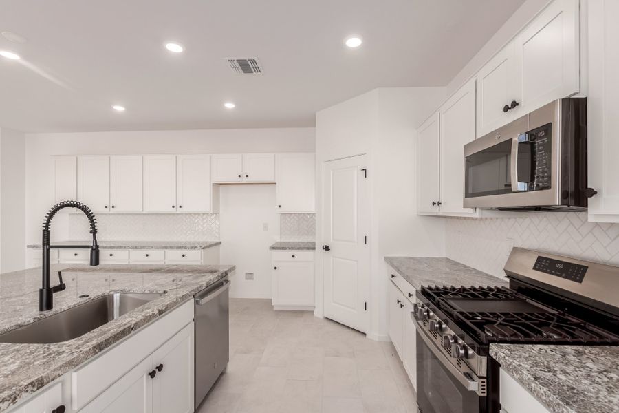 Furnished interior view inside a new home in Teravalis, Buckeye (Image 6).