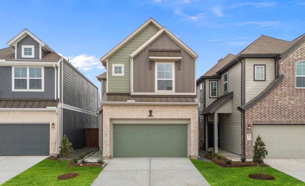 Front exterior of a new home in Meridiana, Manvel, TX, highlighting curb appeal (Image 27).