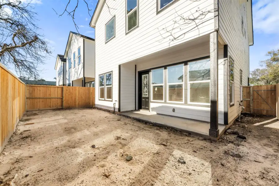 Exterior details and patio area of a home in , Houston (Image 2). Exterior details and patio area of a home in , Houston (Image 2).
