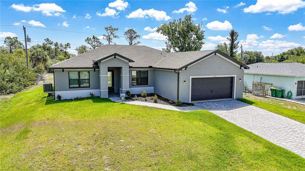 Front exterior of a new home in , Port Charlotte, FL, highlighting curb appeal (Image 30). Front exterior of a new home in , Port Charlotte, FL, highlighting curb appeal (Image 30).