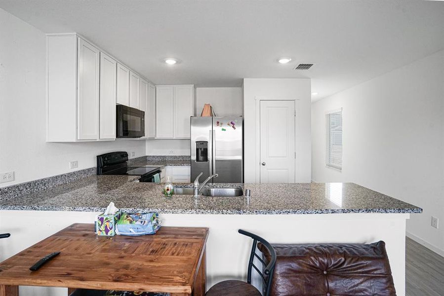 Furnished interior view inside a new home in Tillage Farms, Princeton (Image 12).